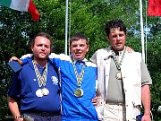 Тройка призеров: Алексей Шанин (В центре) - золото